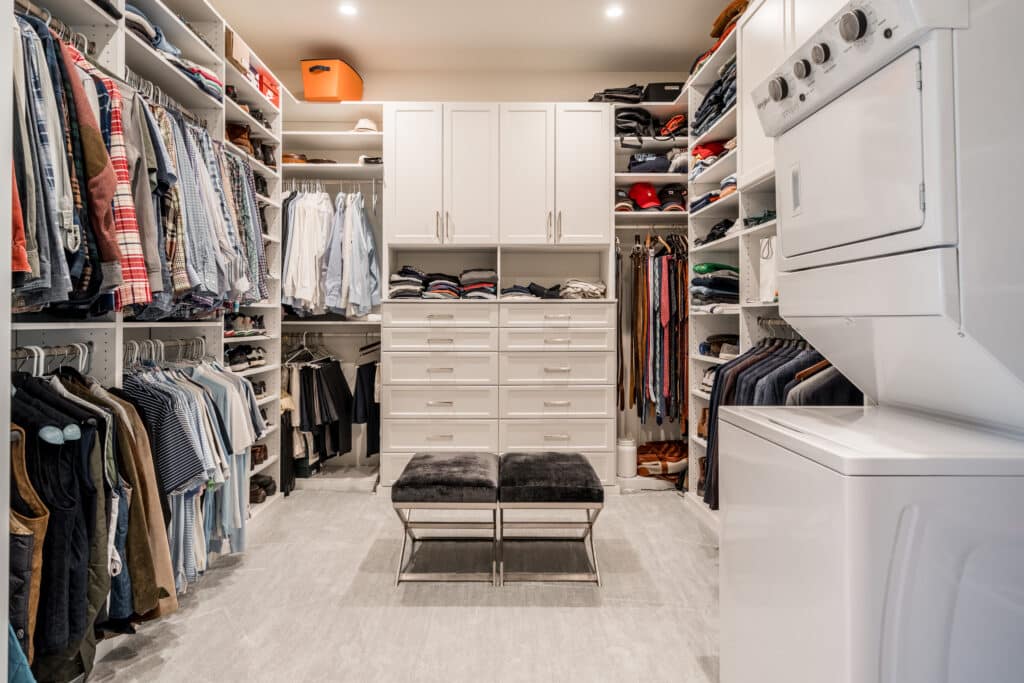 custom master closet with washer and dryer